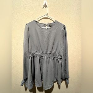 Shein maternity blouse, baby blue color, size Xl, material is 100% polyester.